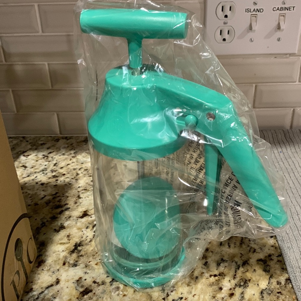 Never used in original box Pampered chef Batter Mixer & Dispenser.